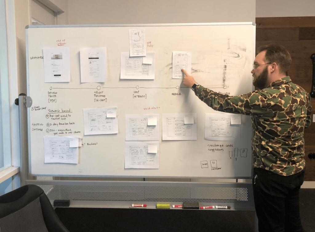 Pictured: Brandon Clark, Convey’s Front-End Engineer, provides input on early design concepts.